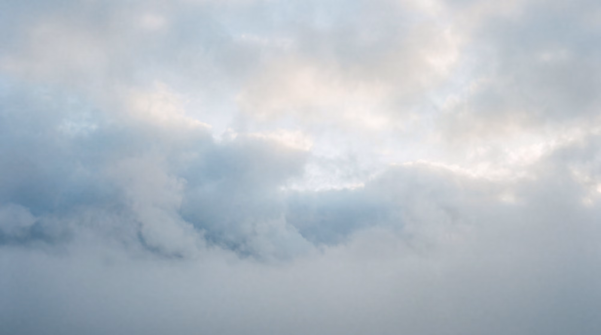 Soft coastal fog and low cloud, pale blue-grey